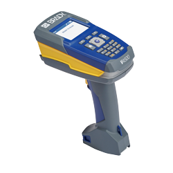 A Brady V4500 wireless industrial barcode reader with the screen illuminated.