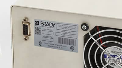 A Brady metallised polyester label applied to the back of a piece of equipment to identify it location, serial number and other information.