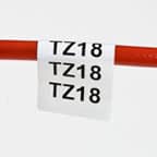 A Brady label that is designed for easy removal and repositioning applied to the cable.